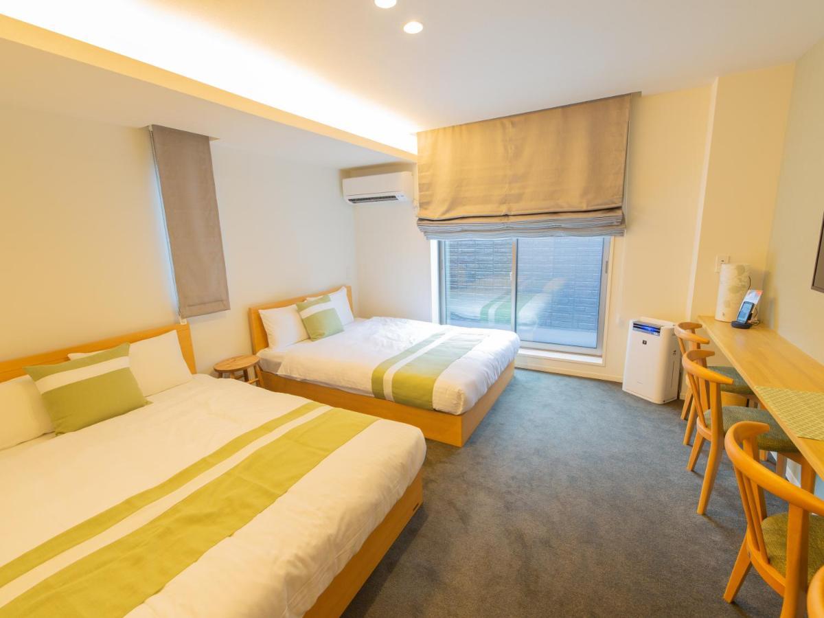 Grand Base Hiroshima Ekimae Aparthotel Exterior photo