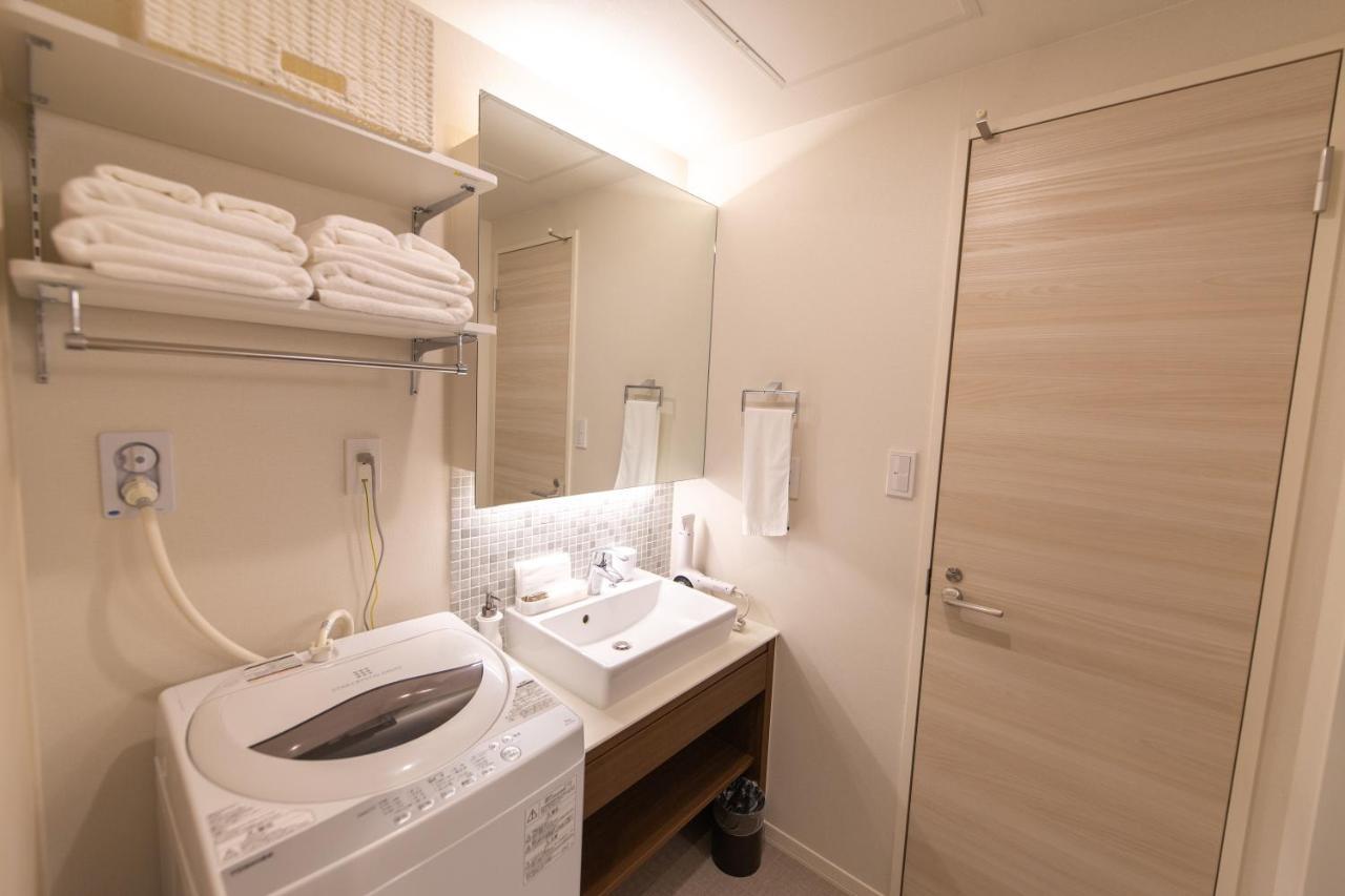 Grand Base Hiroshima Ekimae Aparthotel Exterior photo